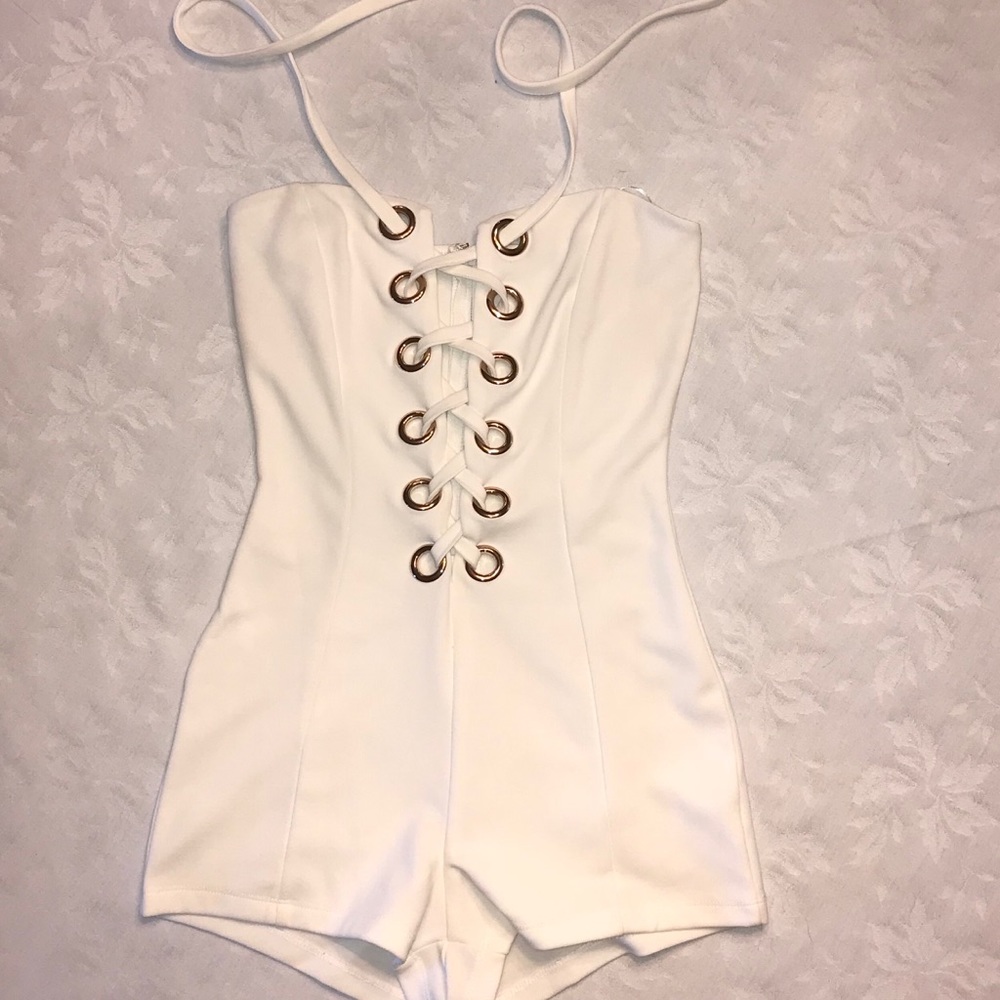 Lace up white romper with rose gold grommets